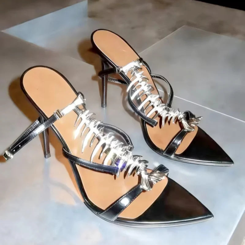Pair of fishbone embellished stiletto heels
