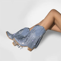 Blue fringe boots with rhinestone details on a white background