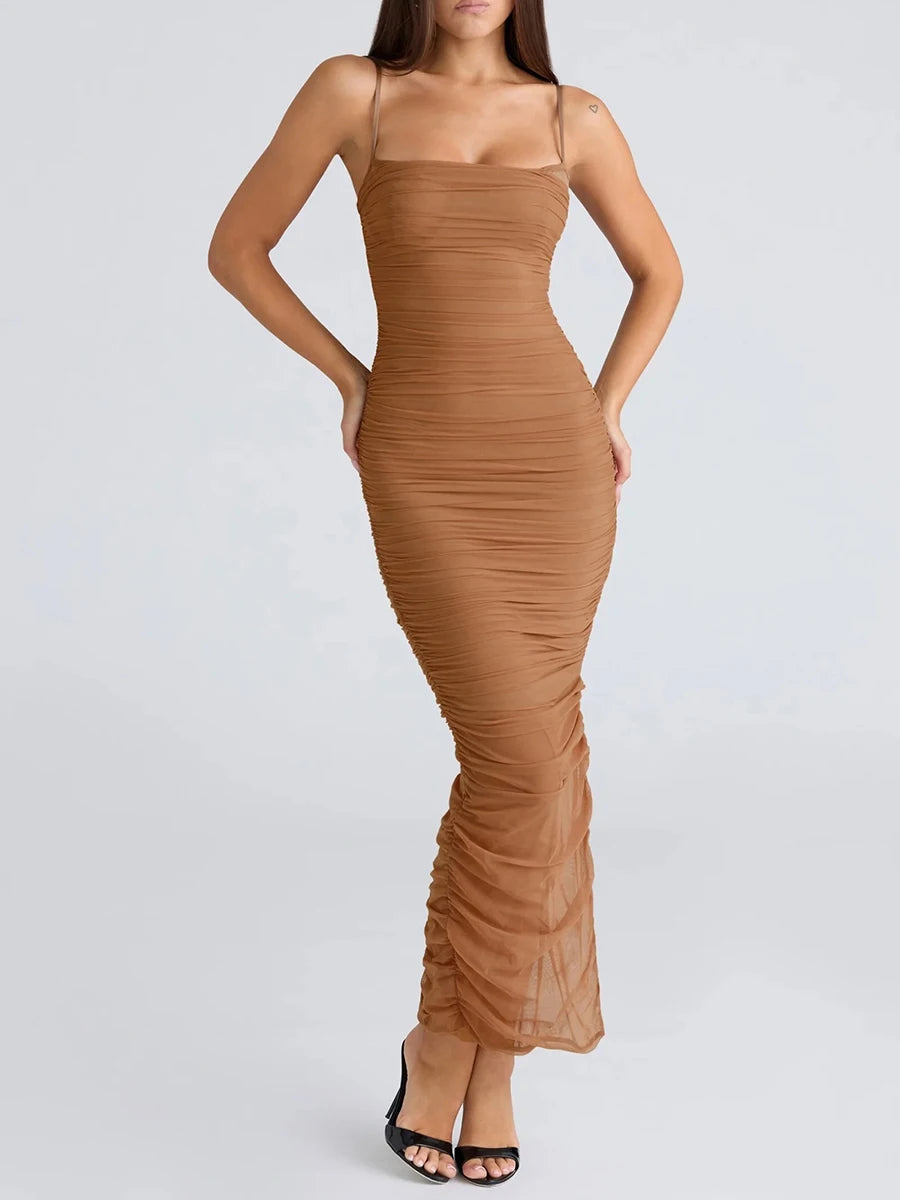 Brown ruched dress worn by a model on a light gray background
