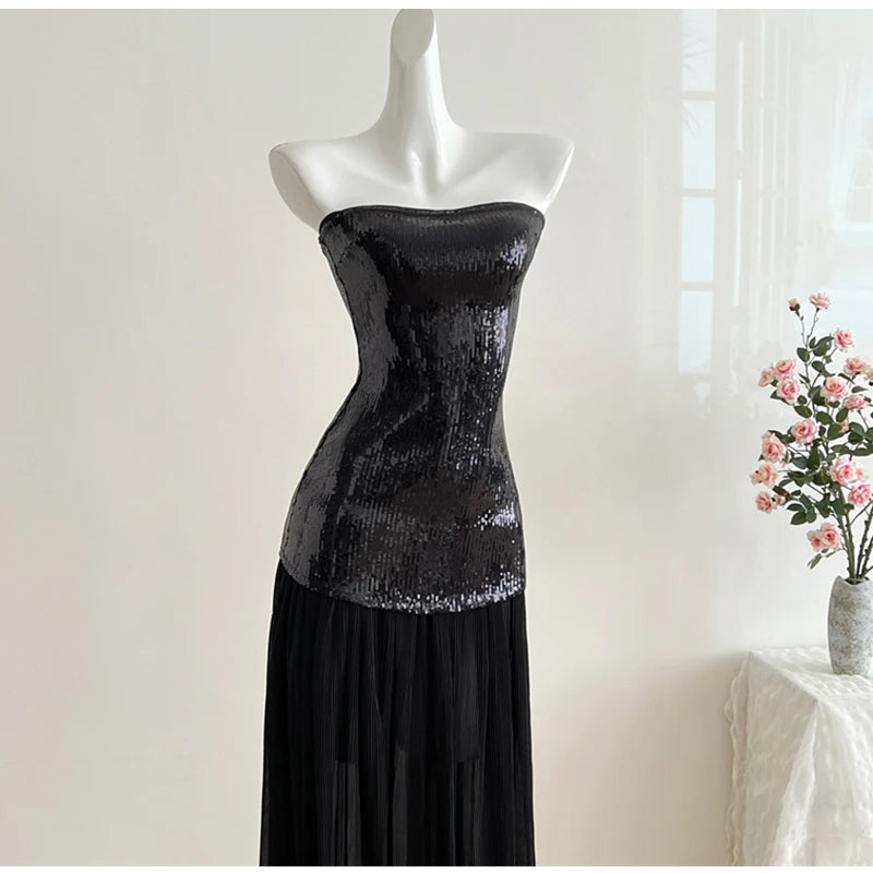 Black strapless sequin bodice maxi dress on mannequin