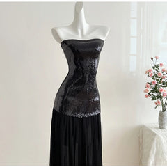 Black strapless sequin bodice maxi dress on mannequin