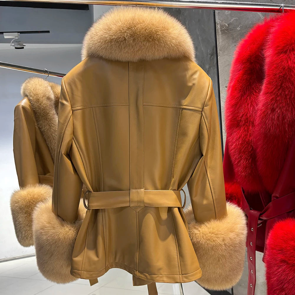 Beige leather coat with fur trim on a rack