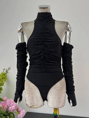 Black ruched bodysuit with long sleeves on a mannequin against a neutral background