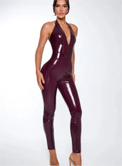 Woman wearing a shiny purple jumpsuit