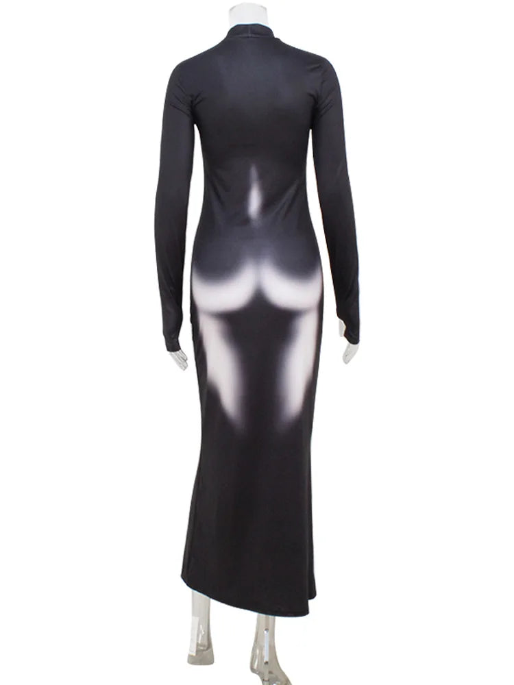Black dress with gradient design on a mannequin against a white background