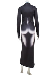 Black dress with gradient design on a mannequin against a white background