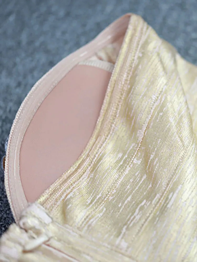 Close-up of a beige garment with a textured surface