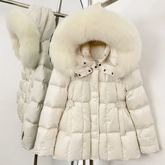 White puffer jacket with fur hood on a rack against a white background