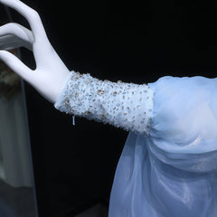 White glove with decorative cuff on a black background