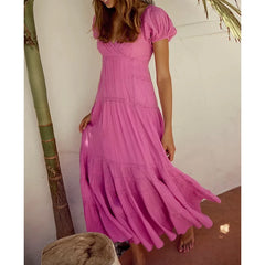 Pink puff sleeve V-neck maxi dress with lace details.