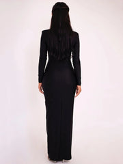 Black long-sleeve gown on a white background