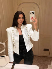 White cropped military style jacket with gold buttons and cord braiding