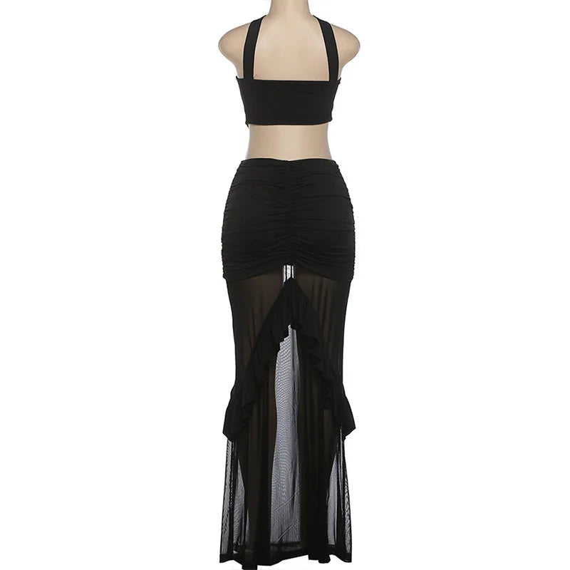 Black halter top and ruched skirt set on a mannequin against a white background