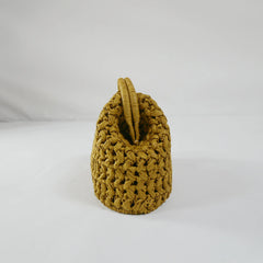 Handcrafted straw handbag with rustic charm and versatile design