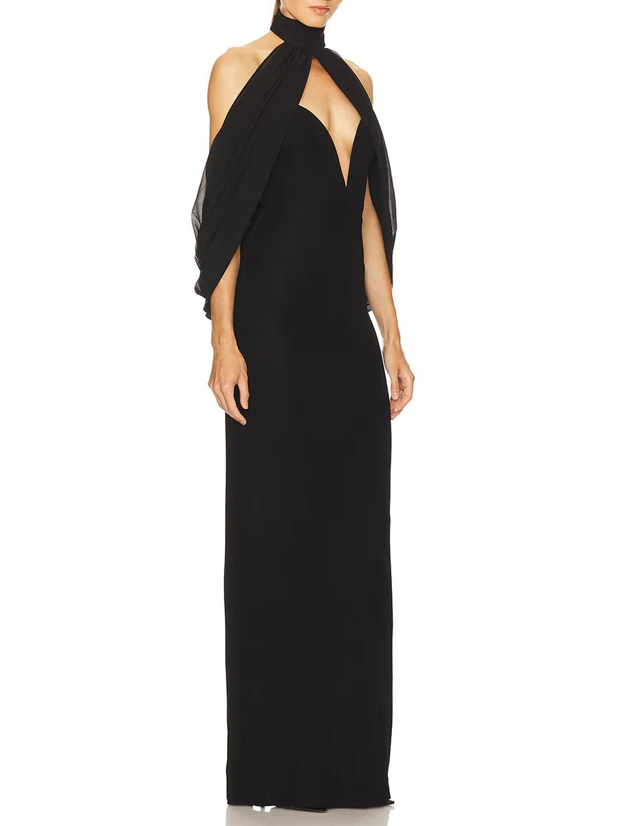 Black halter neck gown on a white background