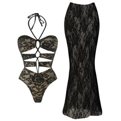 Lace monogram one-piece swimsuit with a matching black lace maxi skirt.