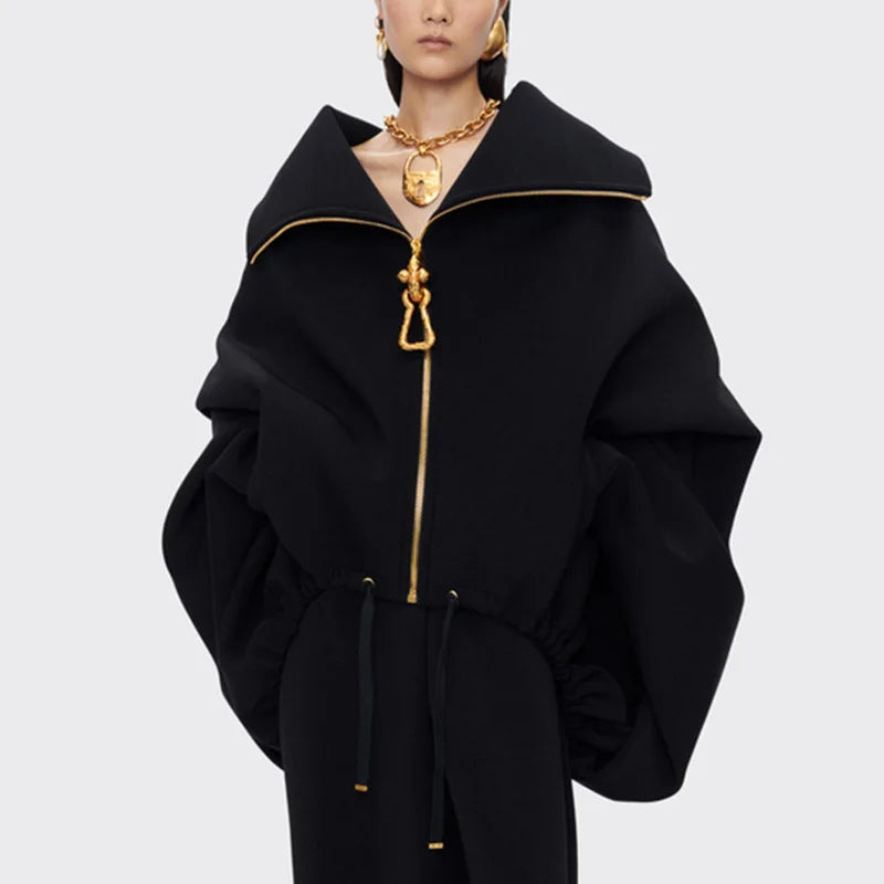 Black coat with gold zipper and trim