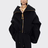 Black coat with gold zipper and trim