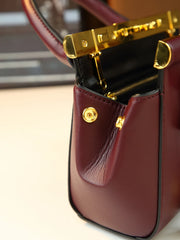 Structured Leather Top Handle Bag With Gold Hardware