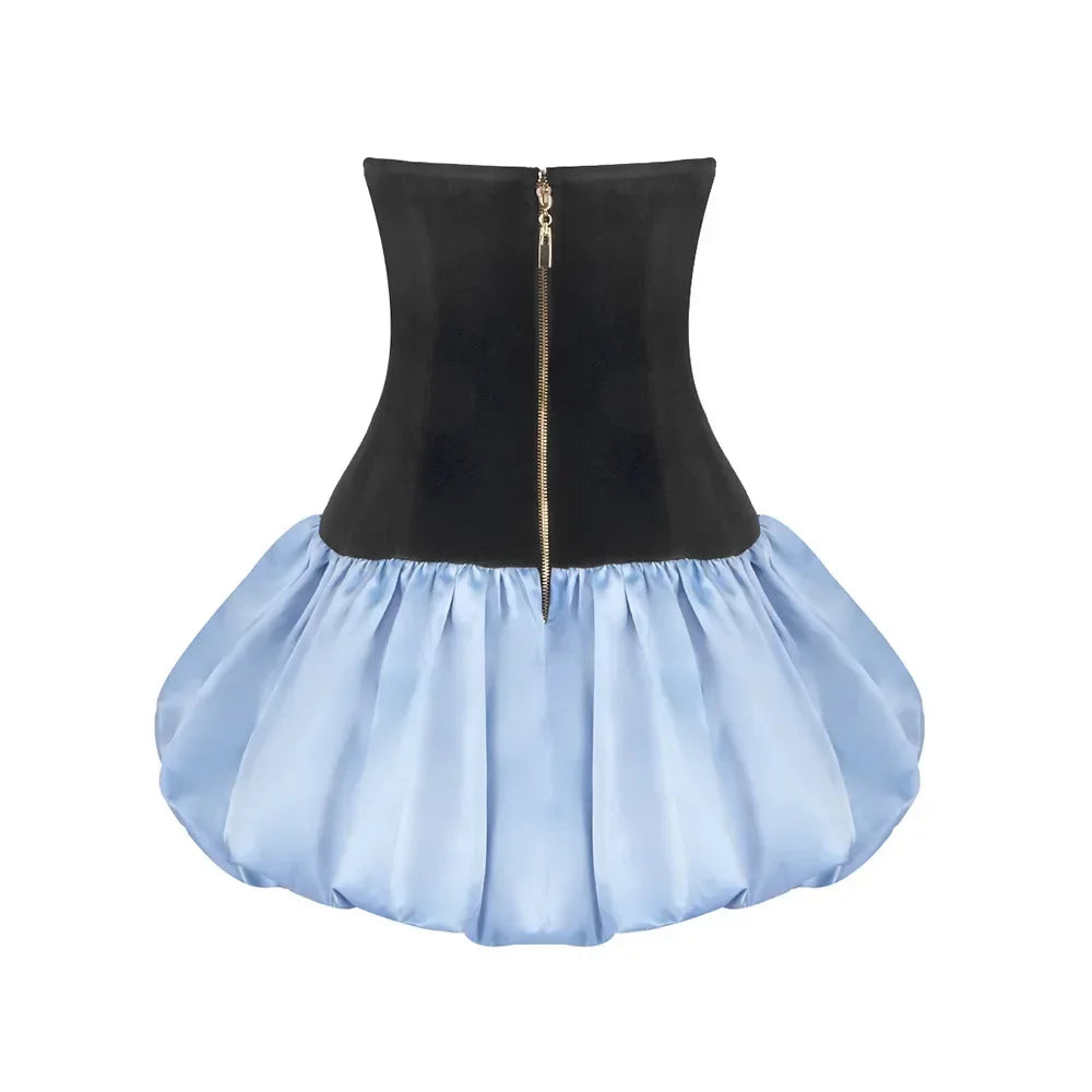Black bodice with gold zipper and light blue skirt