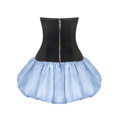 Black bodice with gold zipper and light blue skirt