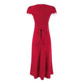 Red polka dot dress on a white background