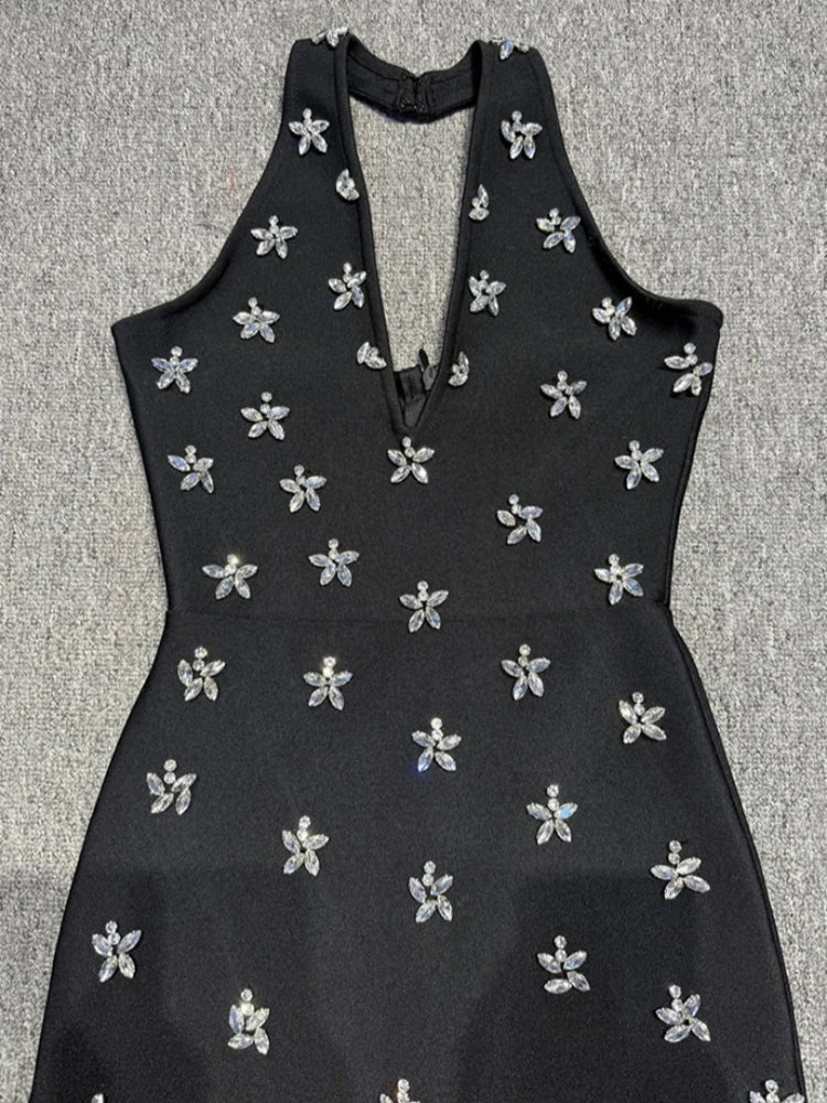 Black halter diamond beaded backless gown.