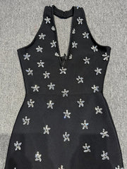 Black halter diamond beaded backless gown.