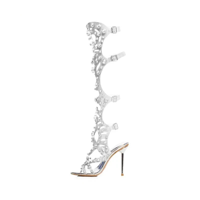 Silver high-heeled sandal with intricate design