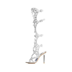 Silver high-heeled sandal with intricate design