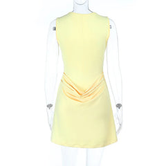 Yellow sleeveless dress on a mannequin against a white background