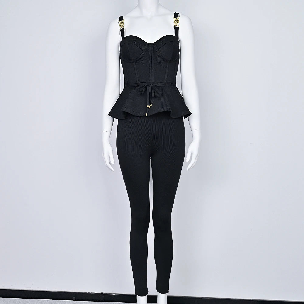 Black peplum top and leggings set on a mannequin against a white background