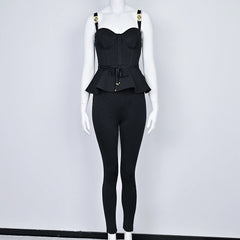 Black peplum top and leggings set on a mannequin against a white background