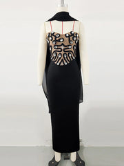 Black dress with patterned back on a mannequin against a white background