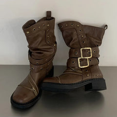 Brown studded ankle boots with buckle and zipper details