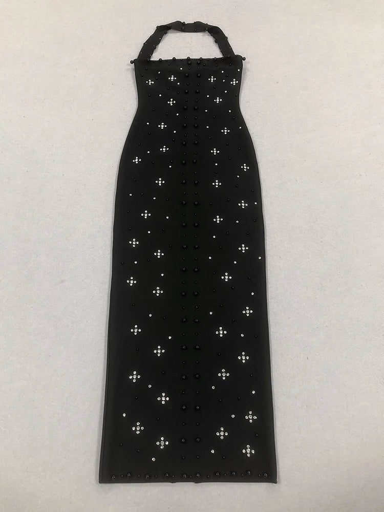 Black dress with white cross patterns on a white background