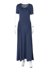 Navy blue dress on a mannequin against a white background