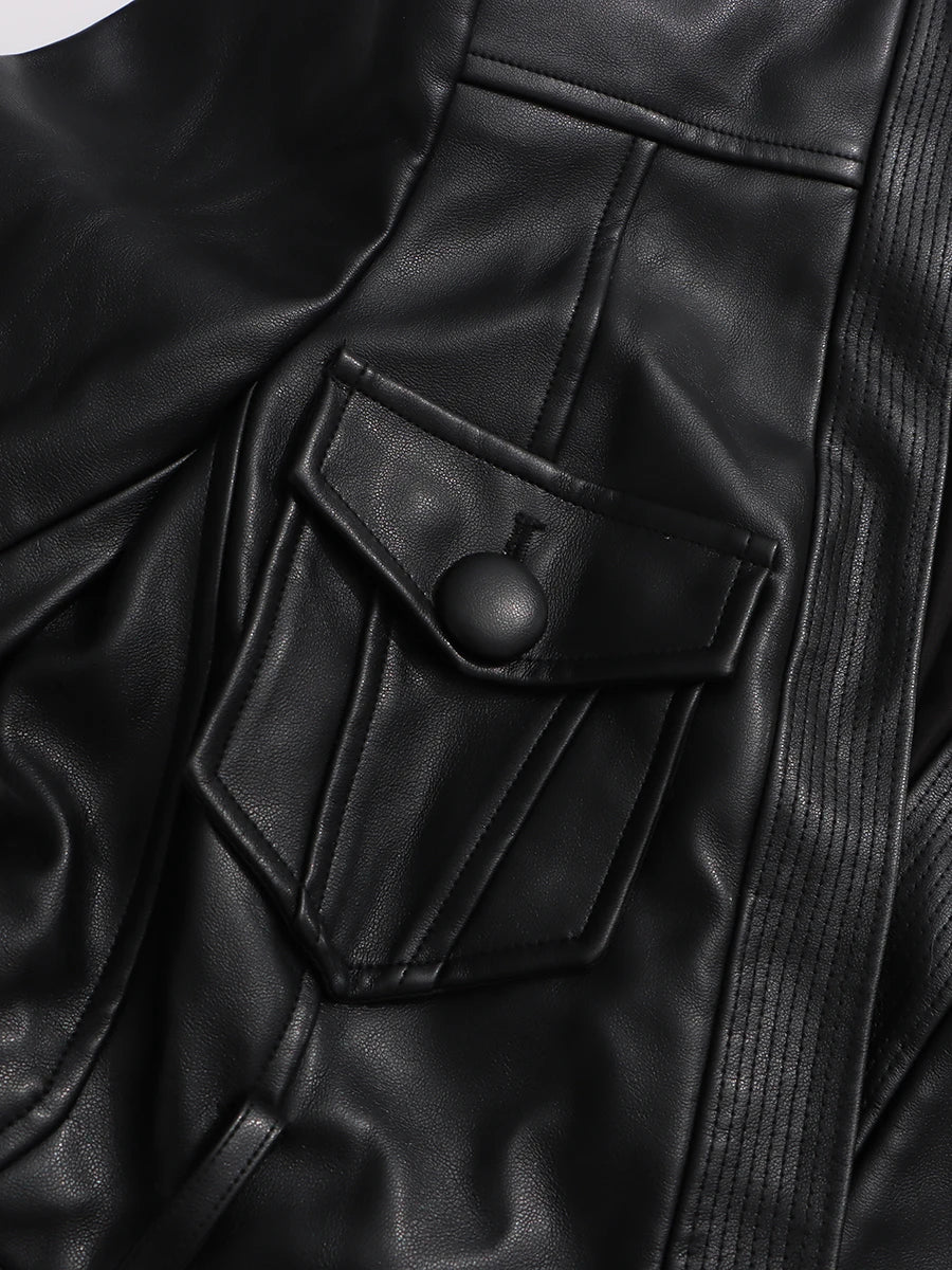 Close-up of a black leather jacket with a buttoned pocket.