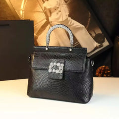 Embellished Ostrich Embossed Top Handle Bag