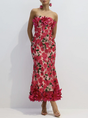 Woman wearing a strapless floral dress with pink flowers