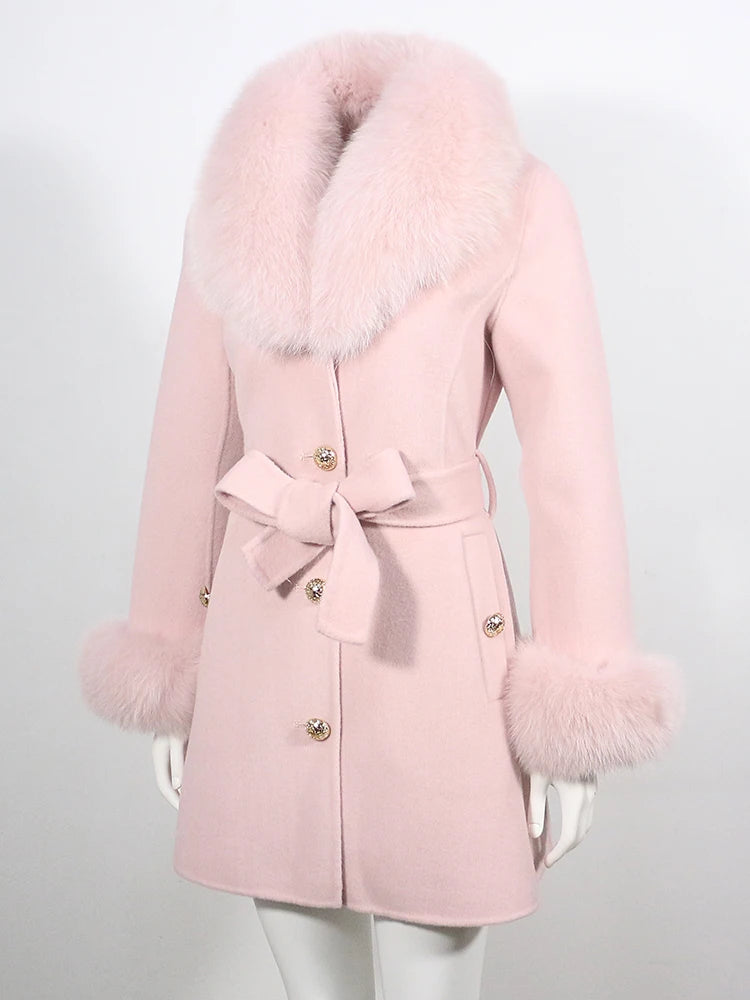 Pink coat with fur trim on a white background