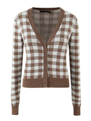 Brown and white checkered cardigan on a white background