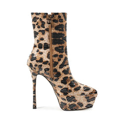 Leopard print high-heeled boot on a white background