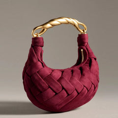 Woven faux suede top with a twisted metal handle.