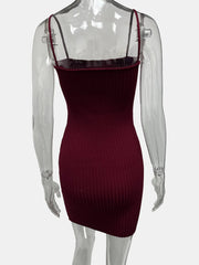 Burgundy ribbed dress on a transparent mannequin against a white background