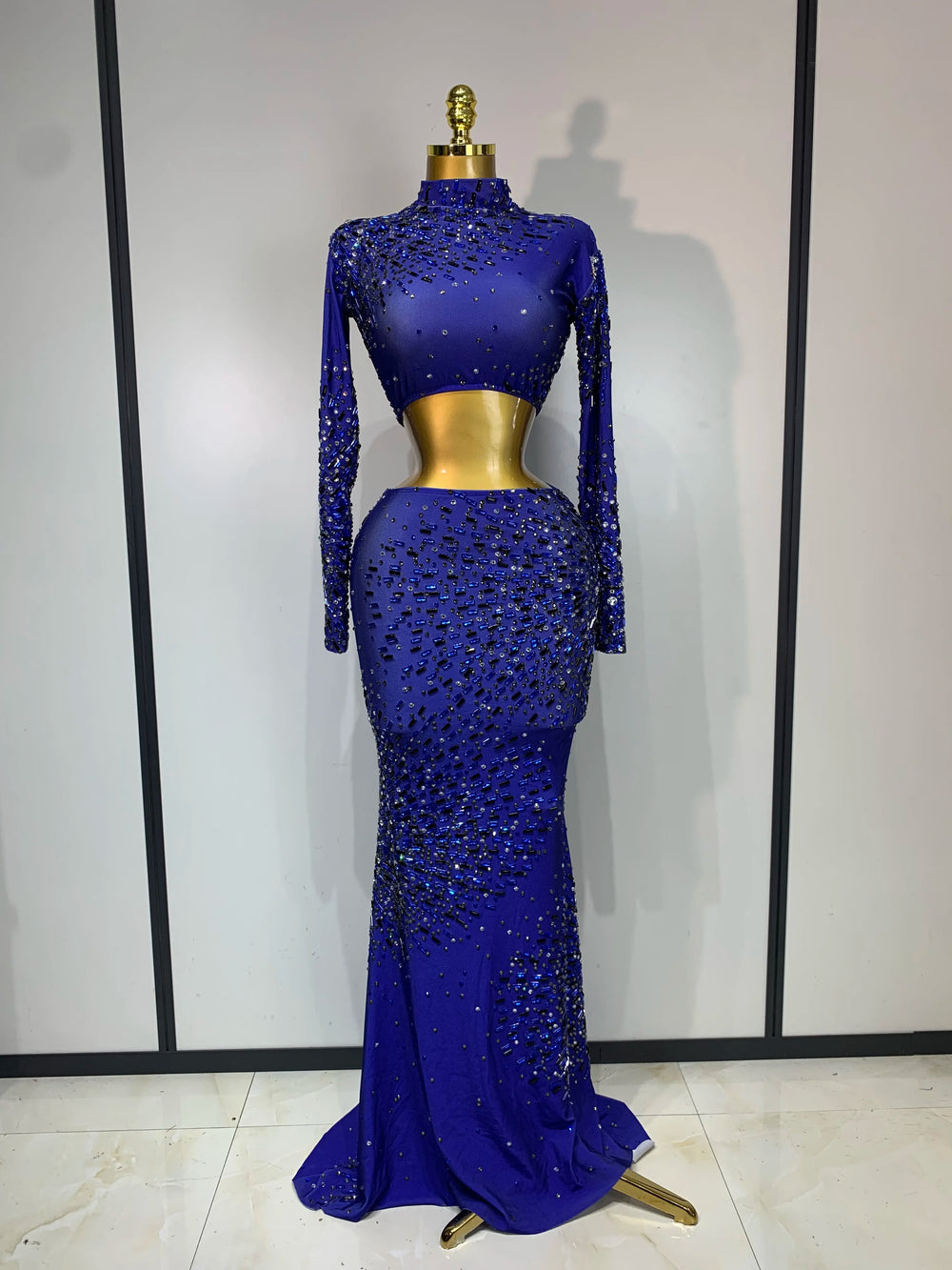 High neck long sleeve cutout rhinestone crop top and floor-length skirt set front view.
