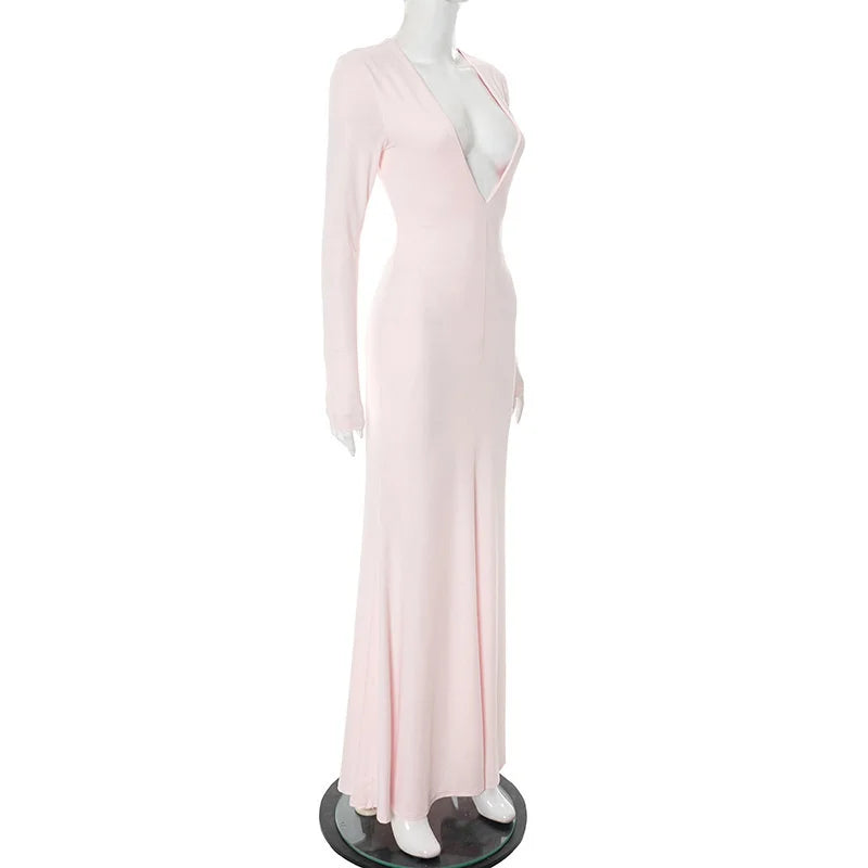 Pink evening gown on a mannequin against a white background