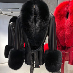 Black leather coat with black fur trim and red fur accents on a rack.