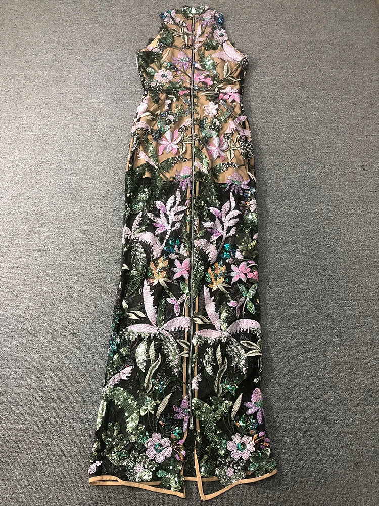 Floral embroidered dress on a gray background