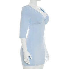 Light blue dress on a mannequin against a white background